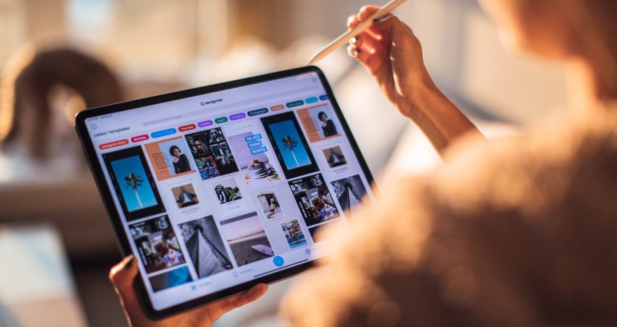 woman holding tablet computer