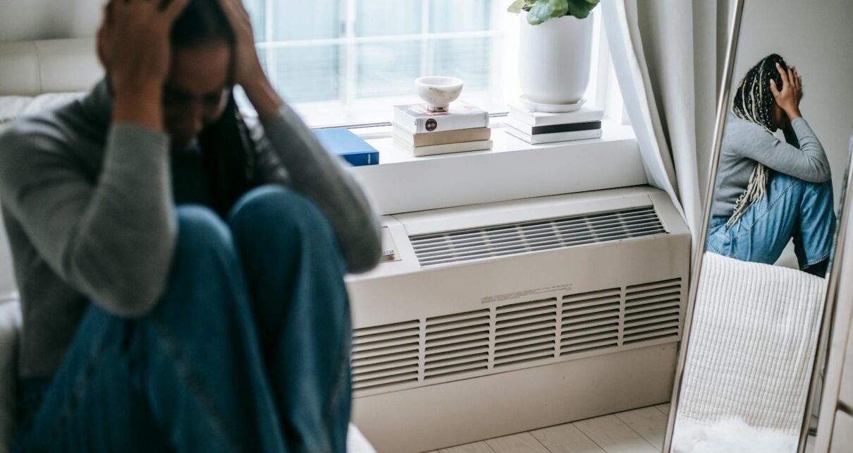 depressed woman having headache and stress