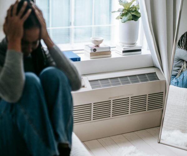 depressed woman having headache and stress